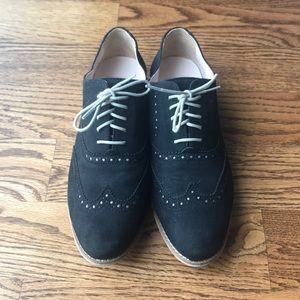 Cole Haan black suede oxfords.
